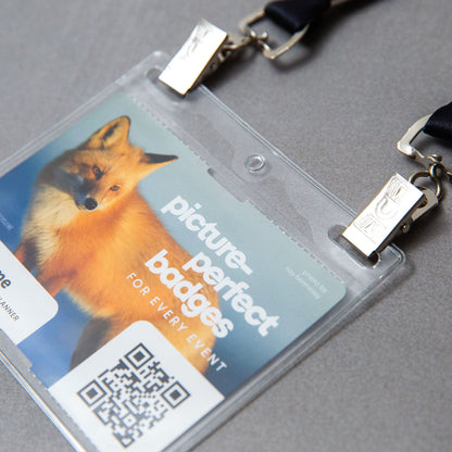Elevate your promotional event, corporate conference, or trade show with recyclable 4x3 double-notch plastic name badge holders. Crafted from soft PVC, these durable badge sleeves offer ultra-clear visibility and pair perfectly with our custom name badges and lanyards.