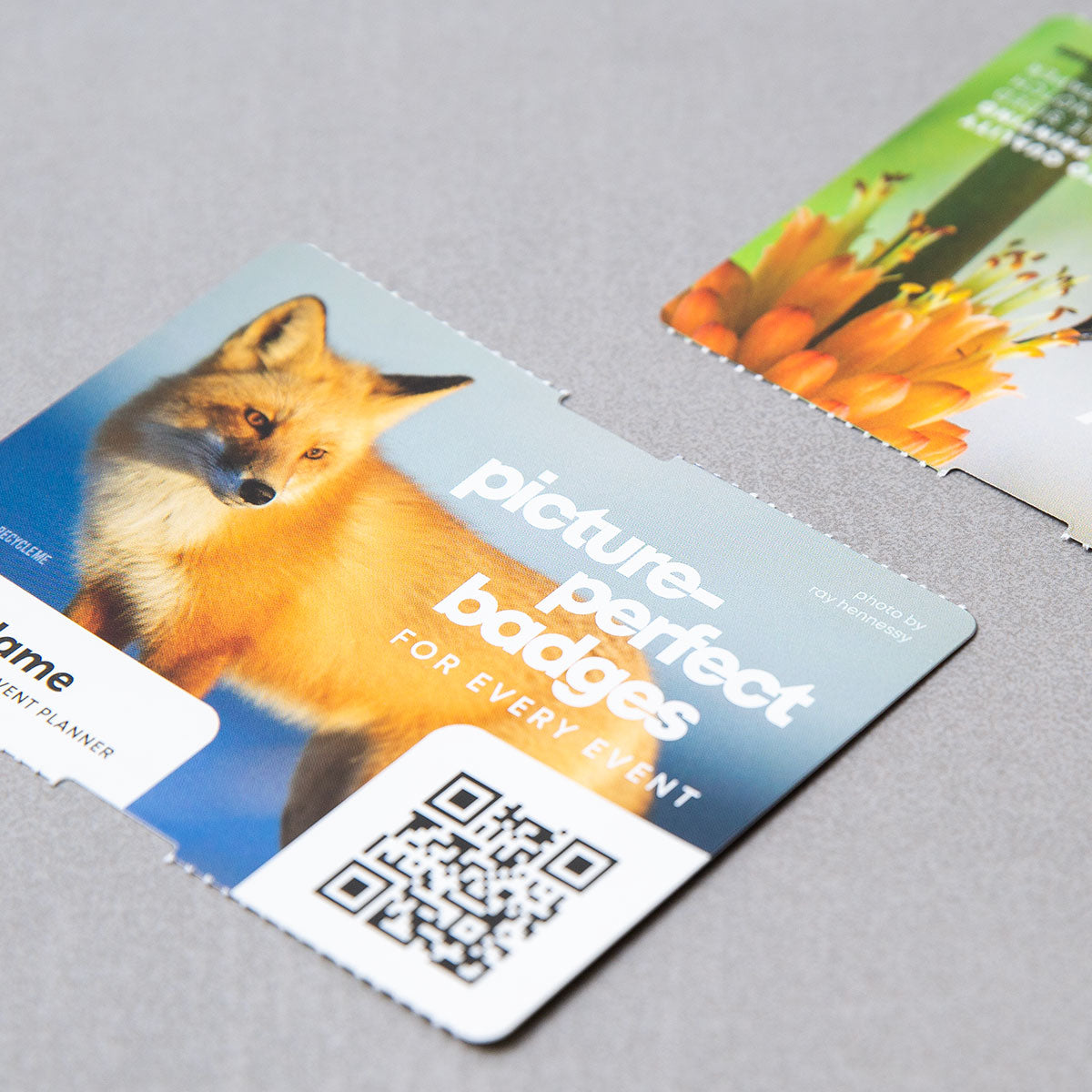 Elevate your brand with our 4x3 double-sided eco-friendly custom event badges. Crafted from premium 9.5 pt direct thermal paper, these personalized event badges offer durability and bring your designs to life with stunning detail and clarity.
