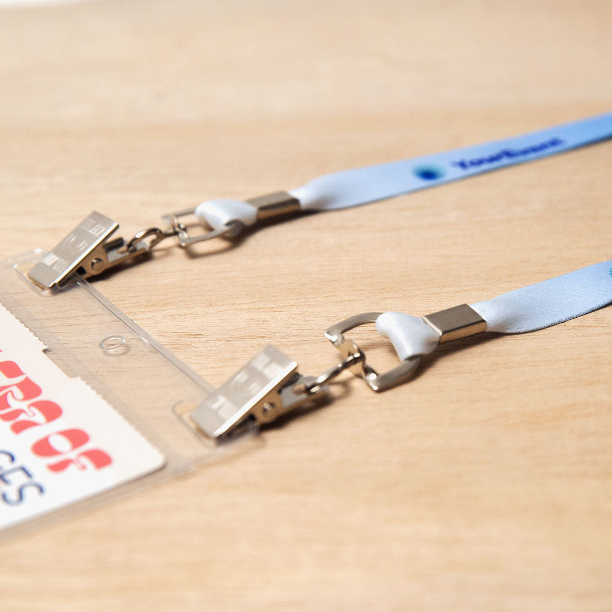 Elevate your brand with our custom badge lanyards. Crafted from premium polyester satin material, feature a double bulldog clip attachment, offering durability and bringing your designs to life with stunning detail and clarity. Eco-friendly options available.