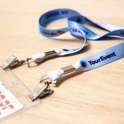 Elevate your brand with our custom badge lanyards. Crafted from premium polyester satin material, our double bulldog conference lanyards offer durability and bring your designs to life with stunning detail and clarity. Eco-friendly options available.