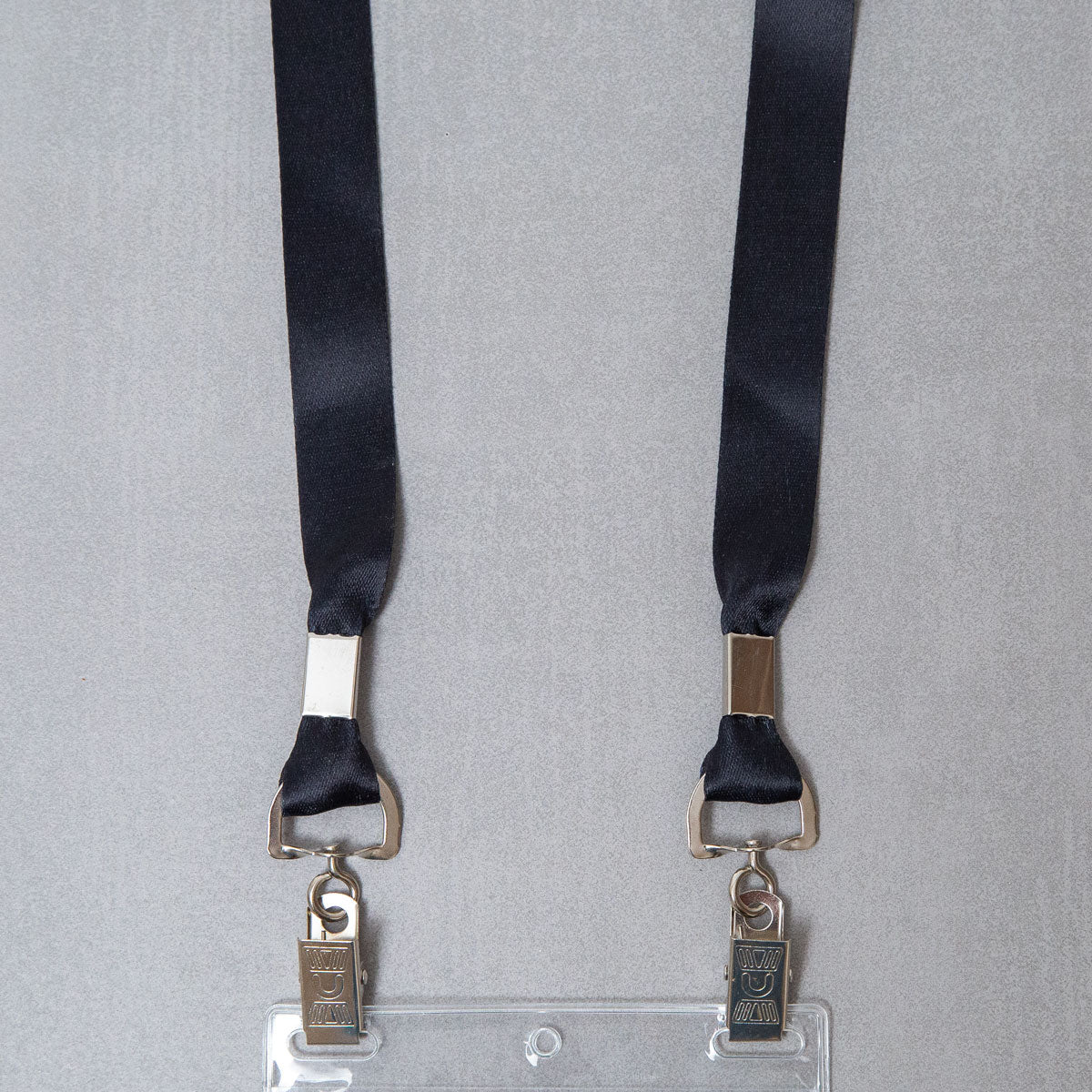 Elevate your brand with our premium black conference badge lanyards. Crafted for durability and featuring vibrant color and a double bulldog clip attachment, our event lanyards combine style and functionality to make a lasting impression.